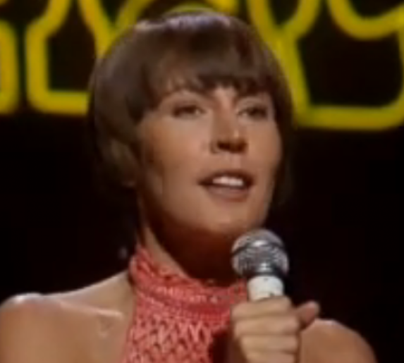 Helen Reddy sings I am Woman, Hear Me Roar