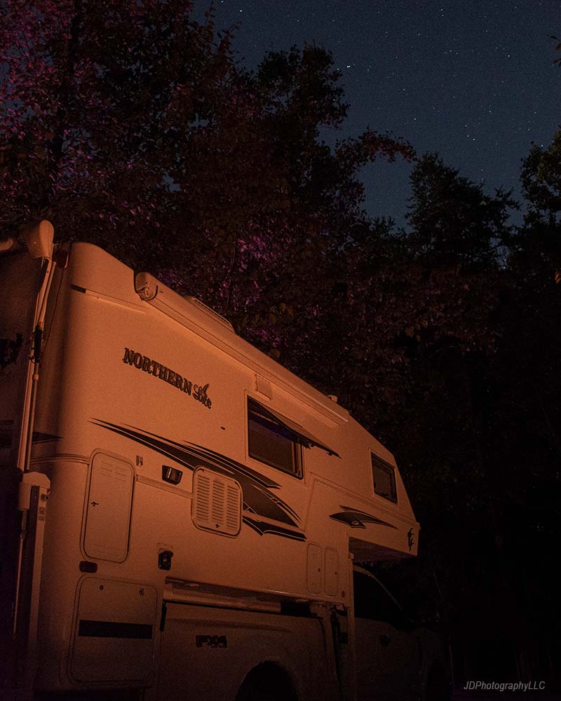Northern Lite Truck Camper with starry night