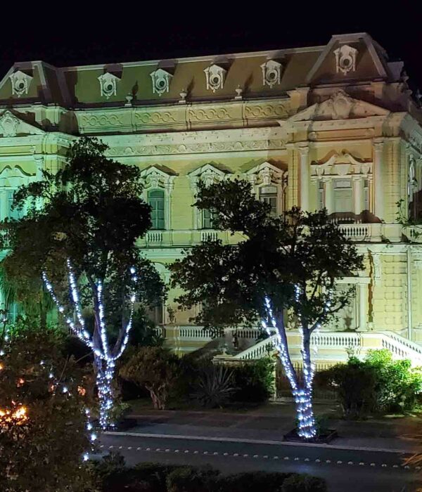 A historic home all lit up along the Paseo de Montejo in Merida, Mexico.
