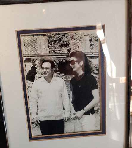 A photograph of the home's owner with Jackie O.