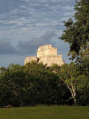 Late afternoon sunlight at uxmal causing the top of the pyramid of the magician to glow Like magic