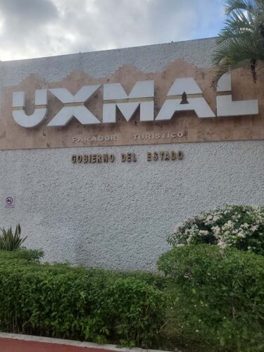 Uxmal sign on the building as you enter the area